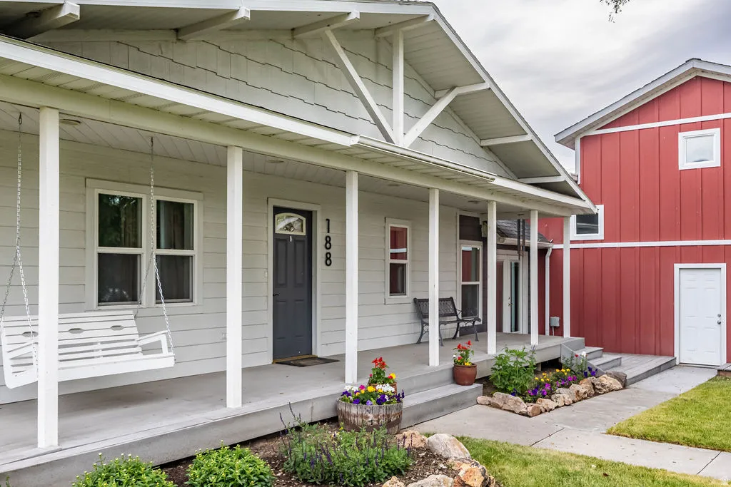 Covered porch with white columns