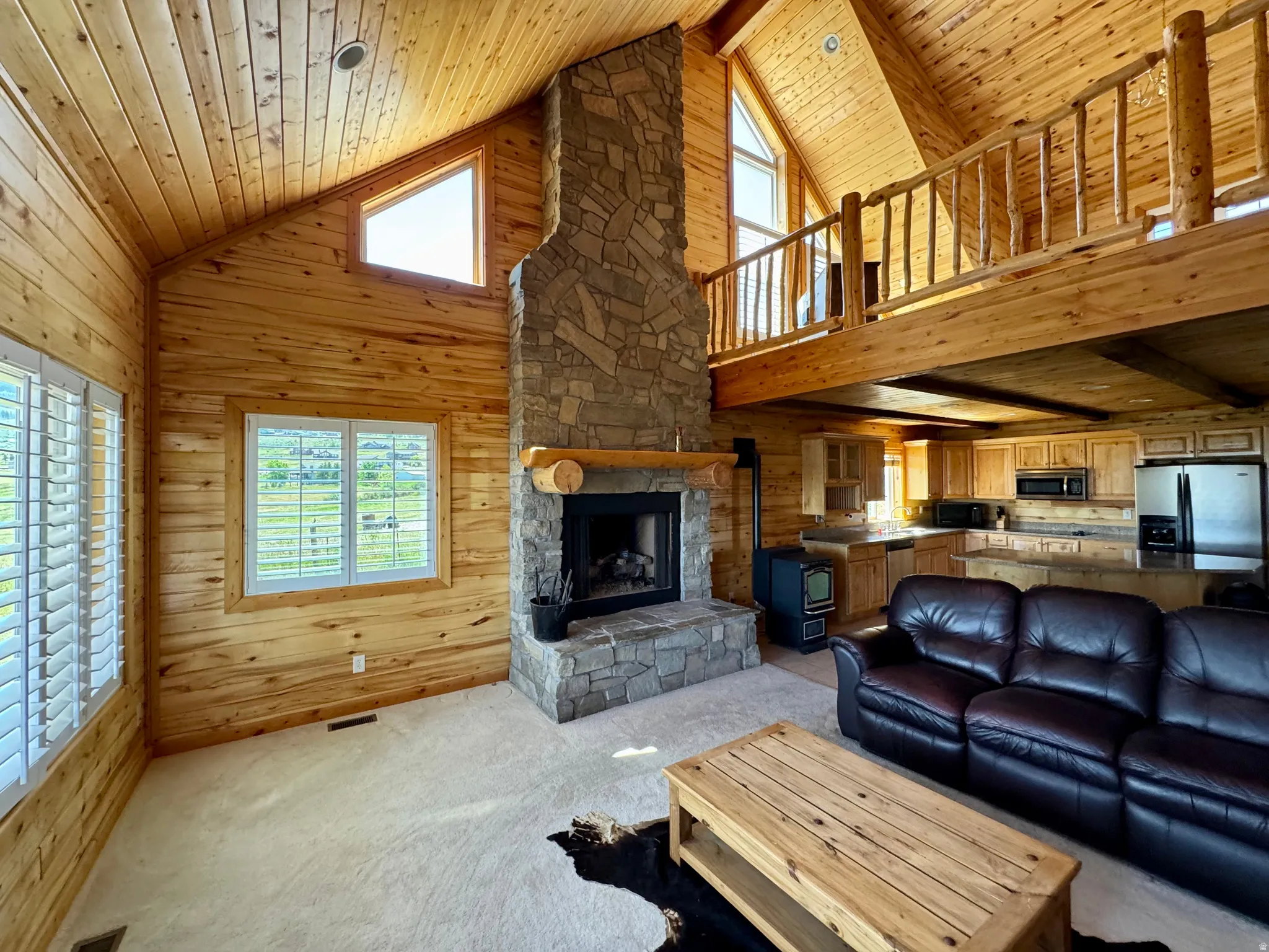 Vaulted wood-paneled ceilings with exposed beams