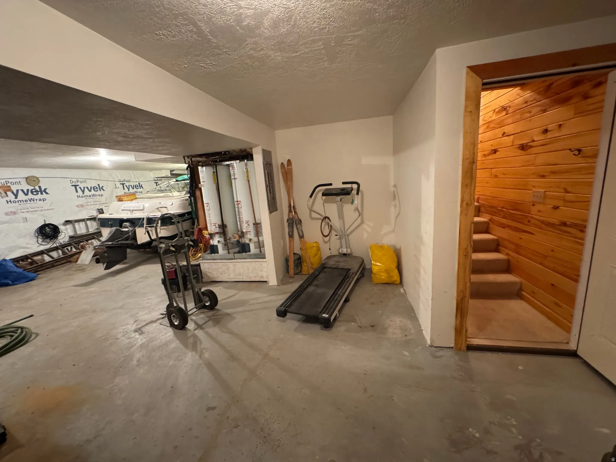 Concrete flooring with white painted walls