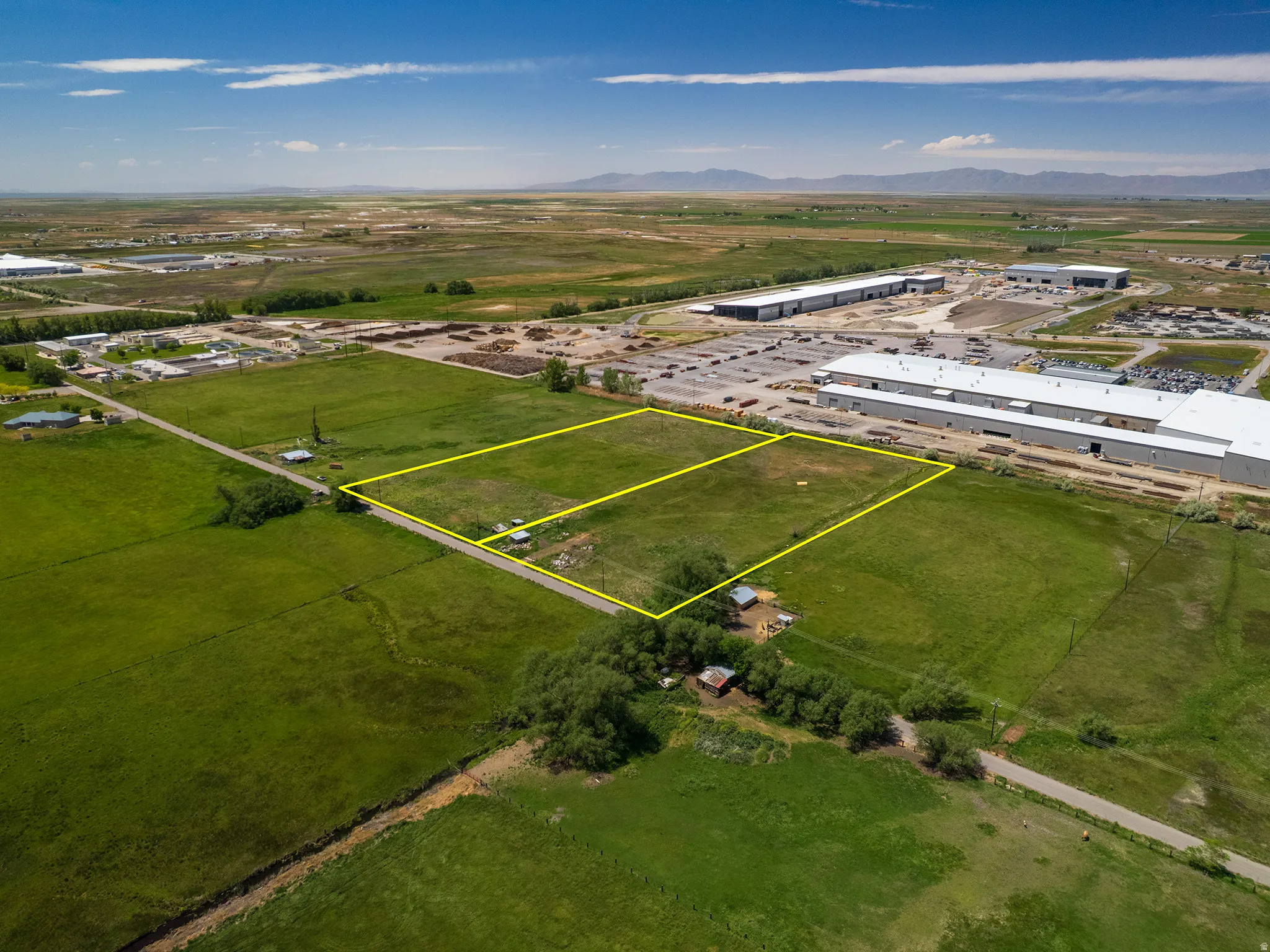 Expansive green space featuring three  parcels including Parcel # 03-077-0015, and adjacent parcel available for sale MLS 2163865 (Parcel #'s 03-077-0011 and 03-077-0012) for a footprint of 8.94 Acres Available.