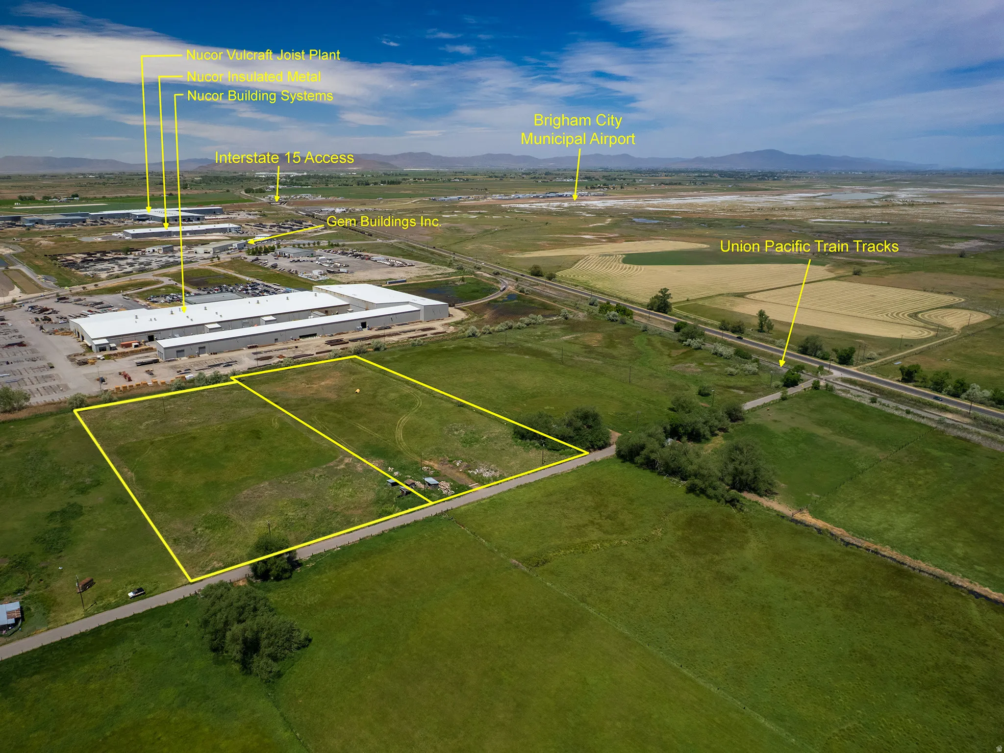 Expansive green acreage with clearly defined boundaries  outlined in yellow, featuring three parcels including Parcel # 03-077-0015, and adjacent parcel available for sale MLS 2163865 (Parcel #'s 03-077-0011 and 03-077-0012) for a footprint of 8.94 Acres