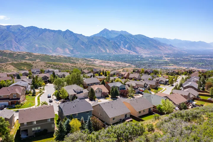 Residential community featuring a variety of single-family homes with mountain and valley backdrops