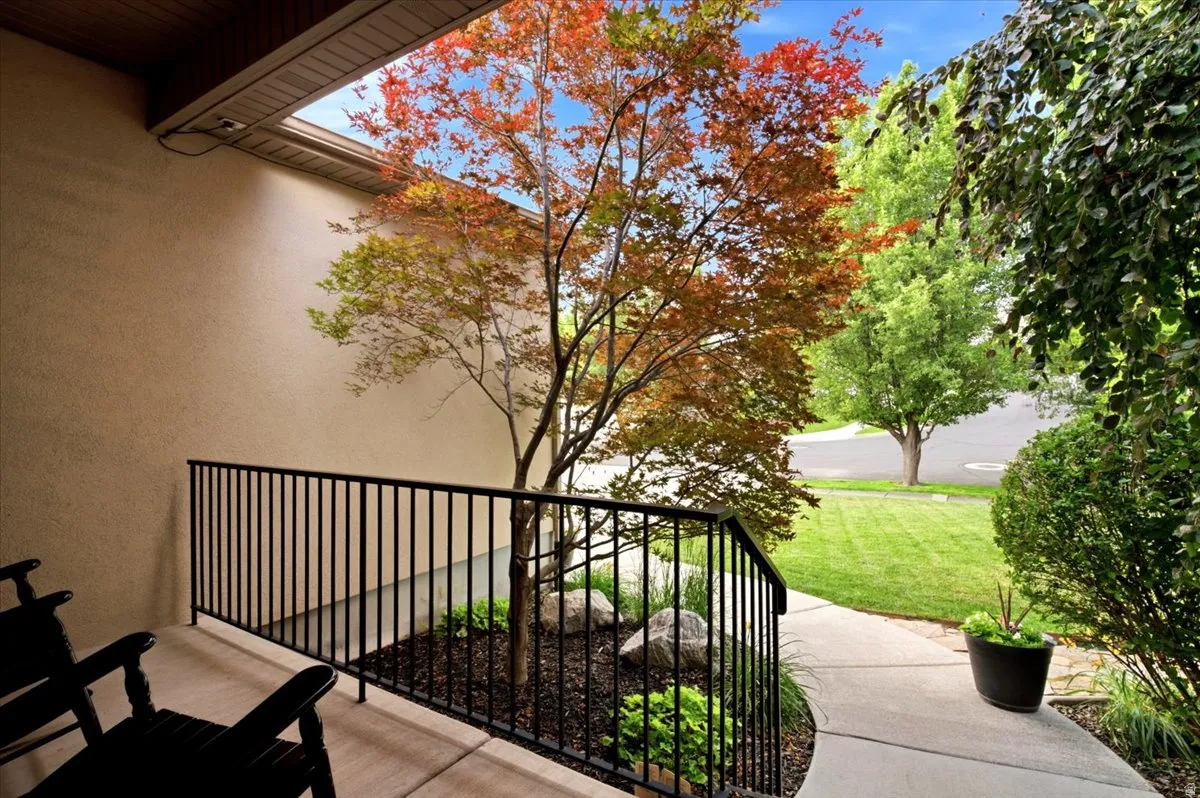 Covered entry with stucco exterior