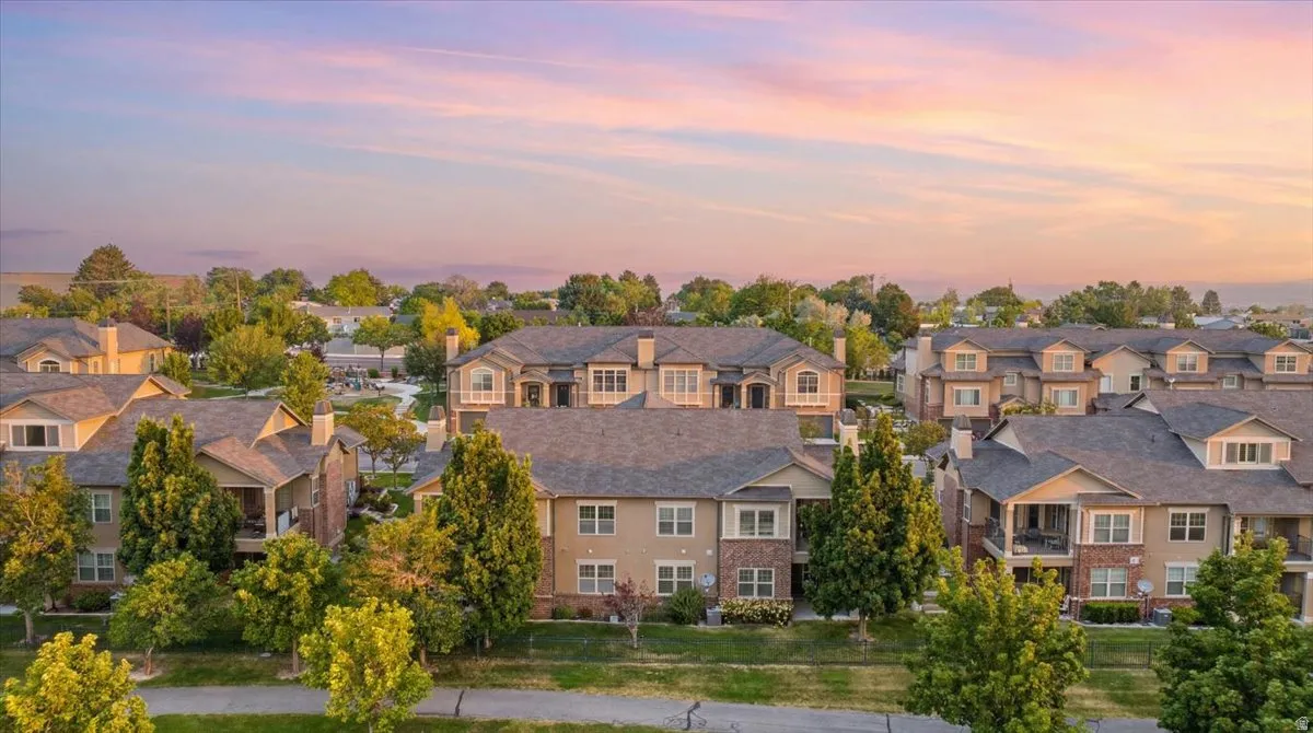 Residential community featuring multi-story buildings with varied architectural details
