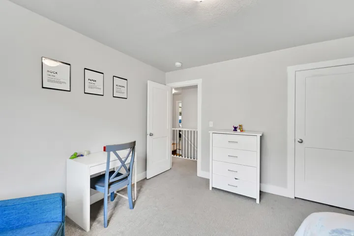 Light gray wall paint complemented by white trim and doors