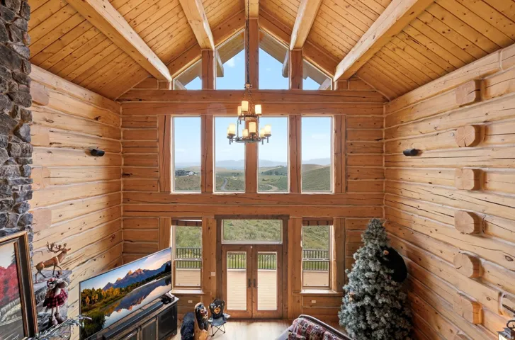 Vaulted wood-paneled ceiling with exposed beams