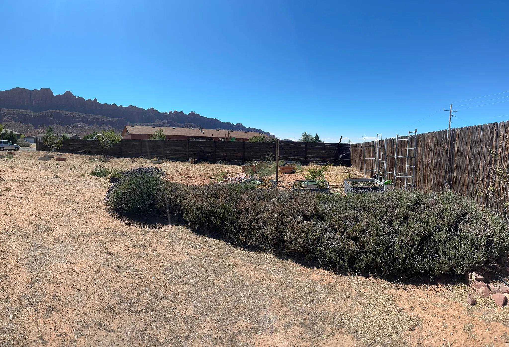 Expansive yard with a partial wood privacy fence