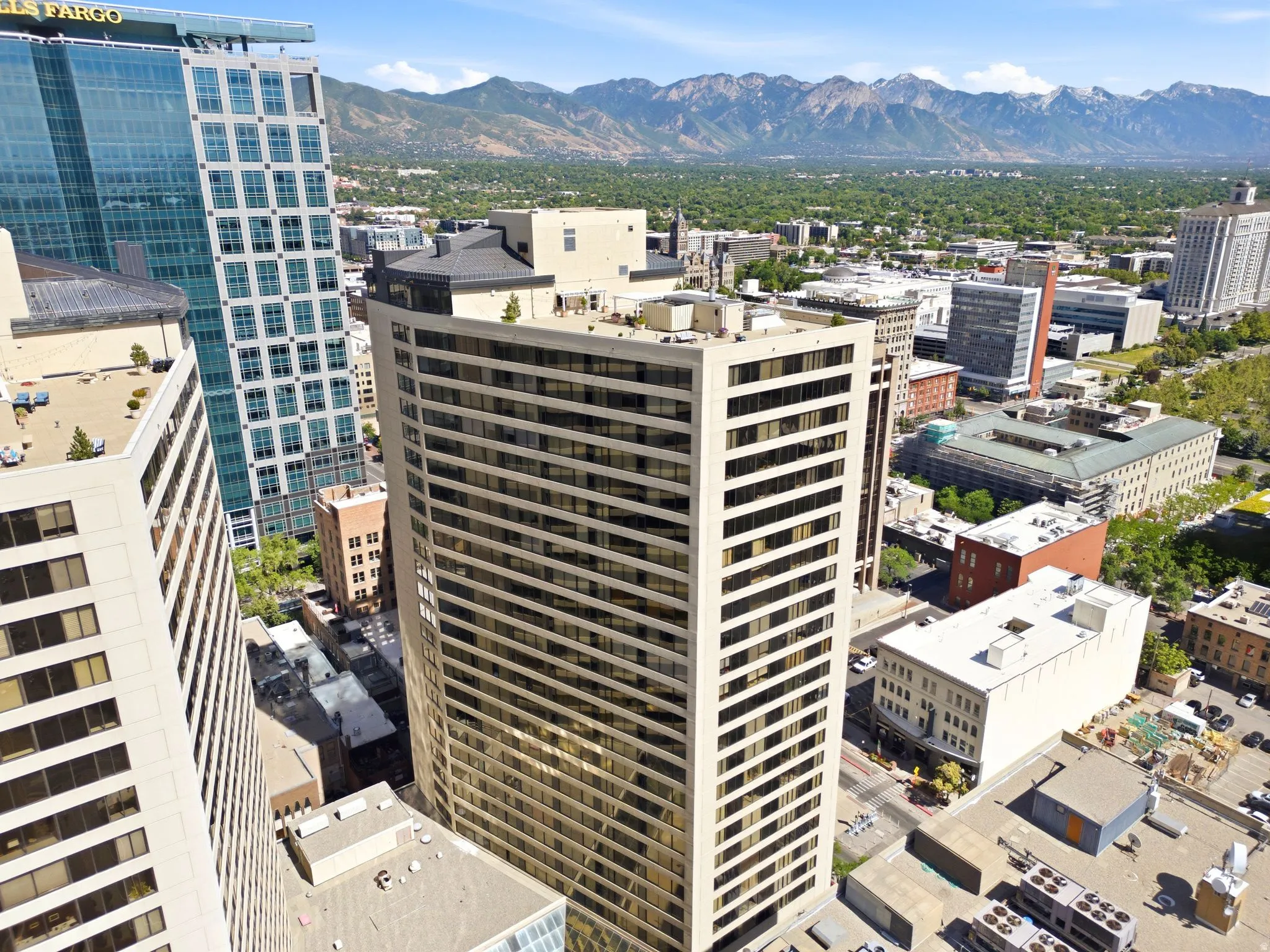 High-rise south tower building view, set within a dense urban environment