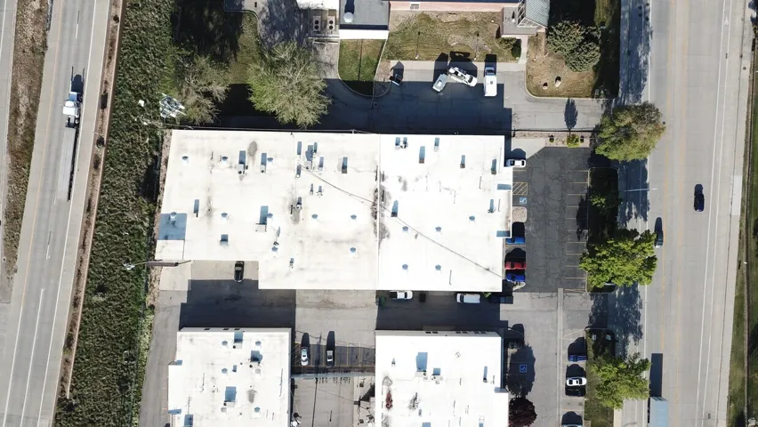 Large commercial property featuring a flat roof structure