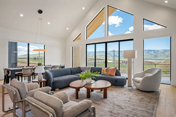 Vaulted ceilings with abundant natural light from expansive windows