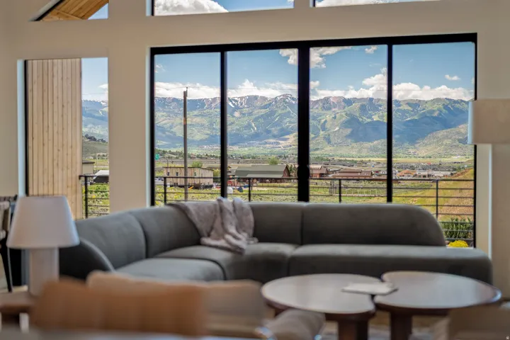 Expansive window wall showcasing mountain and valley scenery