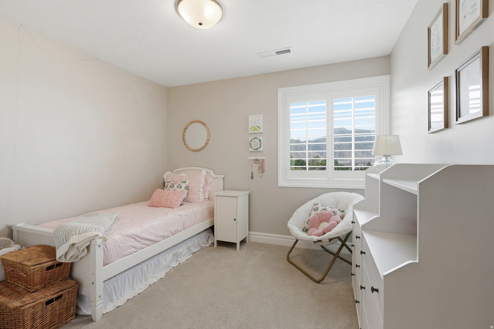 Recessed window with white plantation shutters