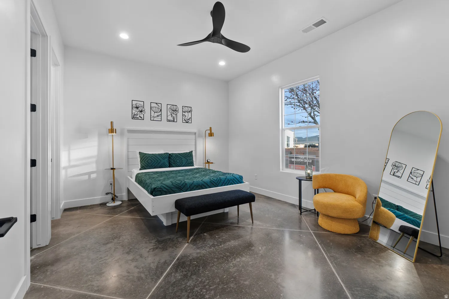 Bedroom featuring polished concrete flooring, a ceiling fan, recessed lighting, and a single window
