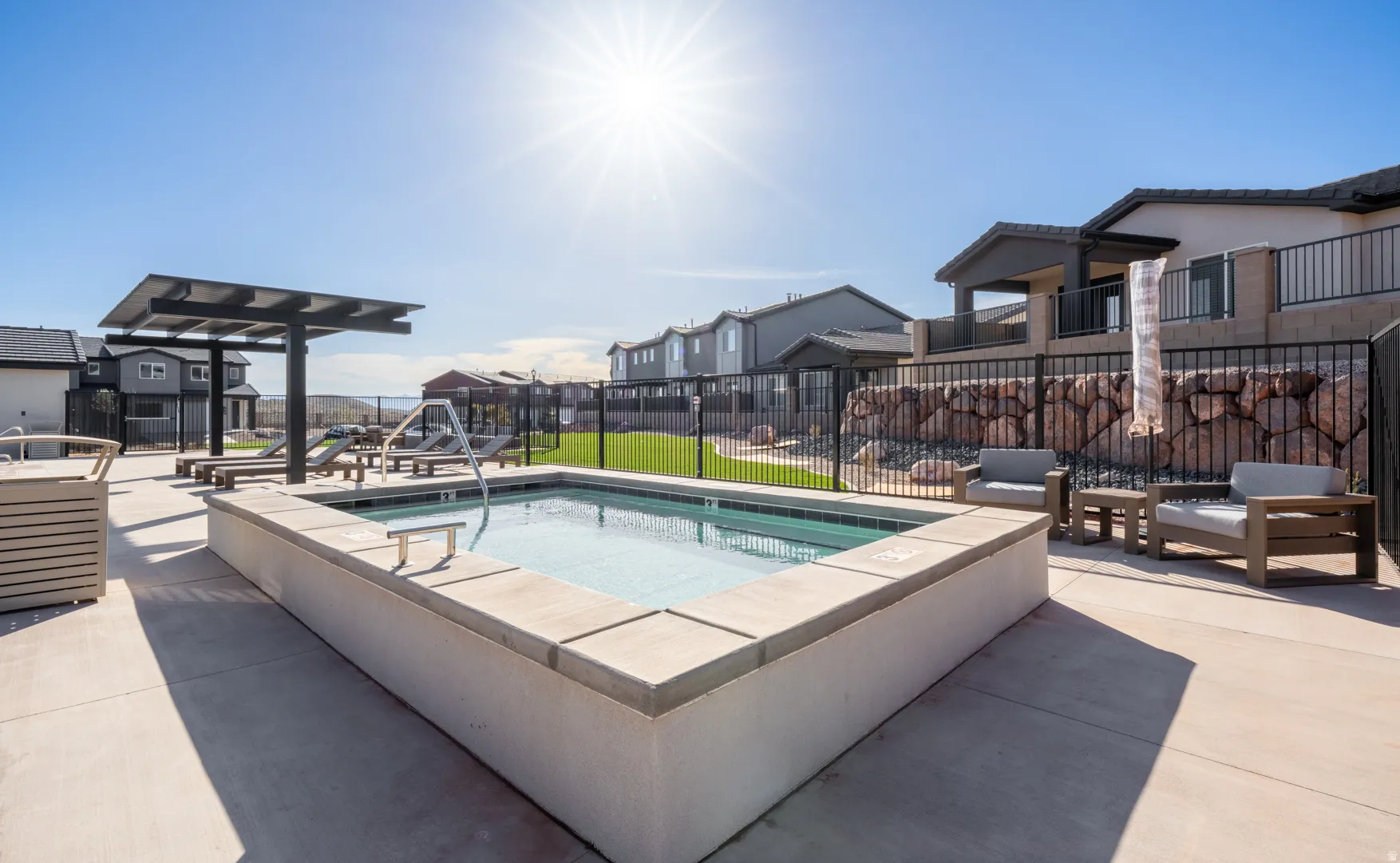 Concrete-surrounded spa with built-in steps