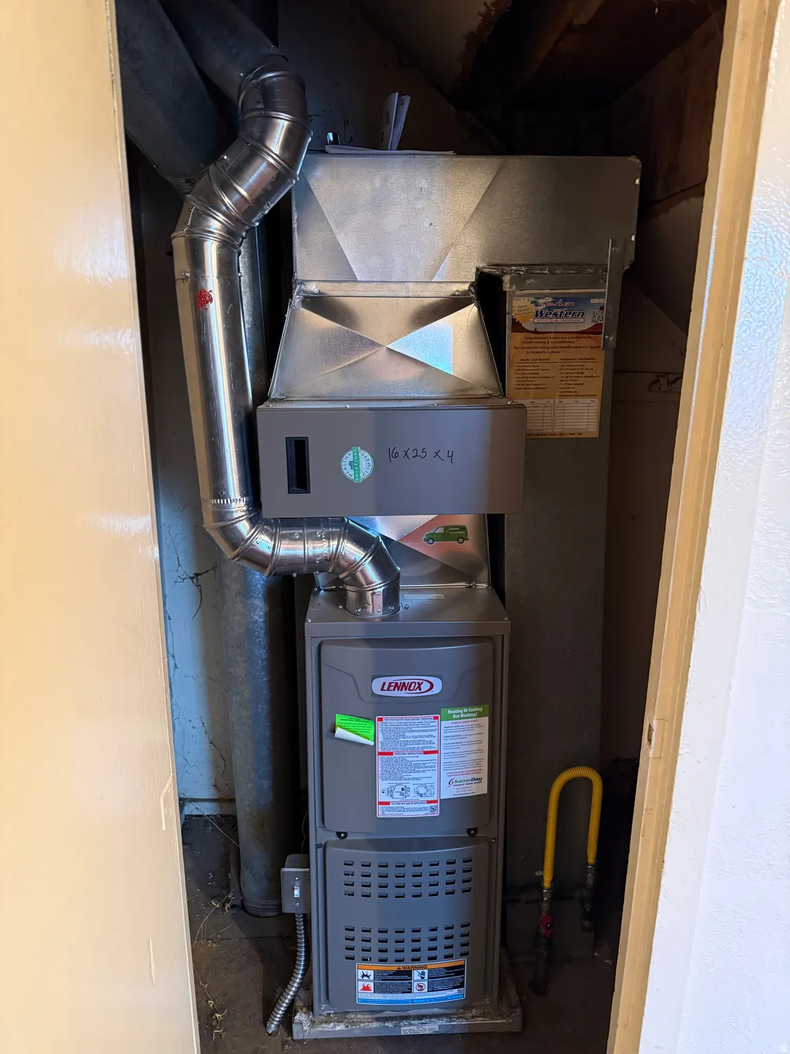 Lennox HVAC system featuring galvanized ductwork and a gas shut-off valve