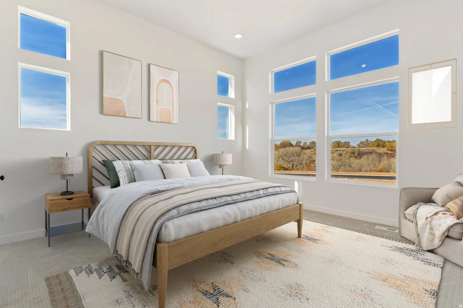 Main Floor owners bedroom with lots of windows. Picture of another home of same floorplan