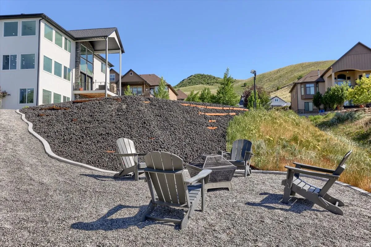 Outdoor fire pit area with gravel hardscaping