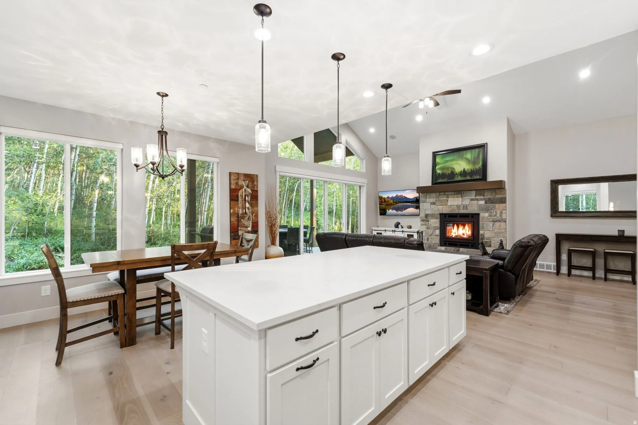 Kitchen island featuring a white countertop and shaker-style cabinetry