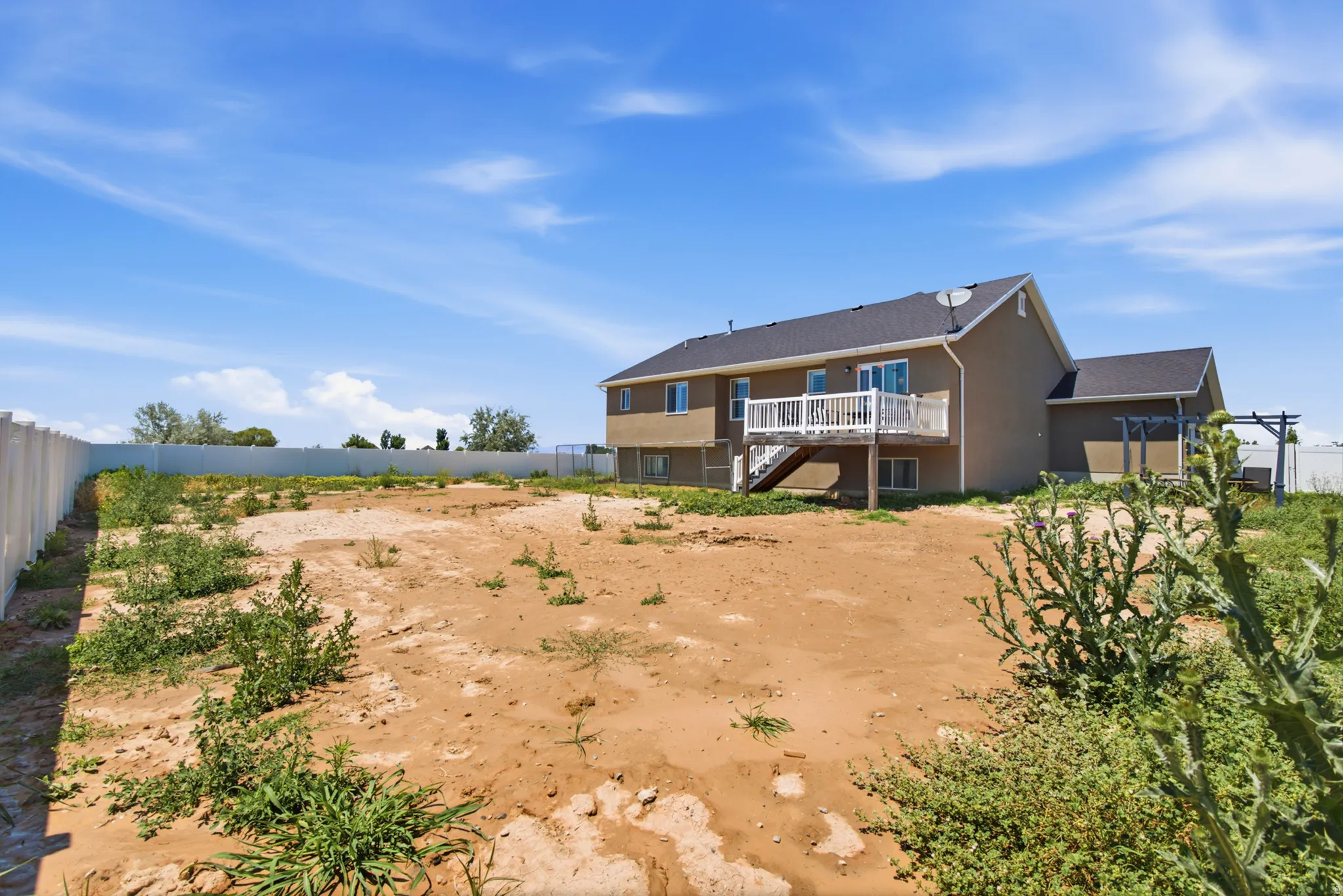 Expansive backyard offering significant potential for landscaping