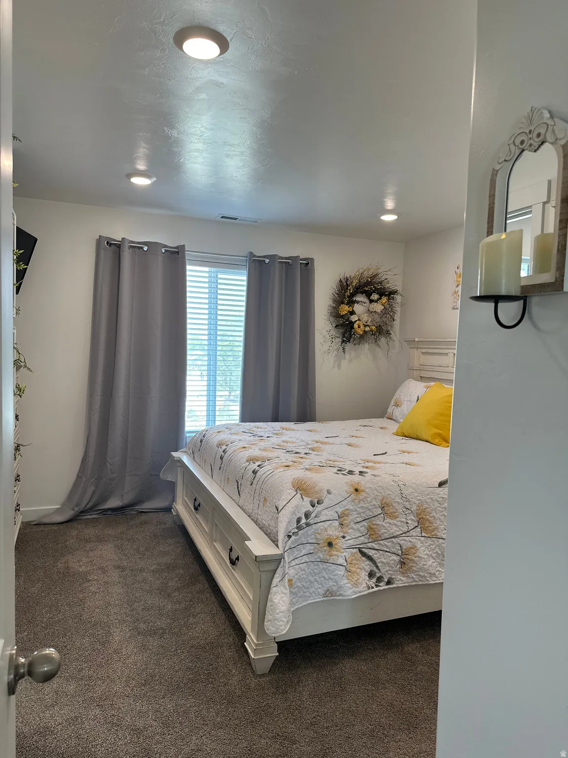 Windowed interior space featuring recessed lighting, a window with blinds, and carpeted flooring