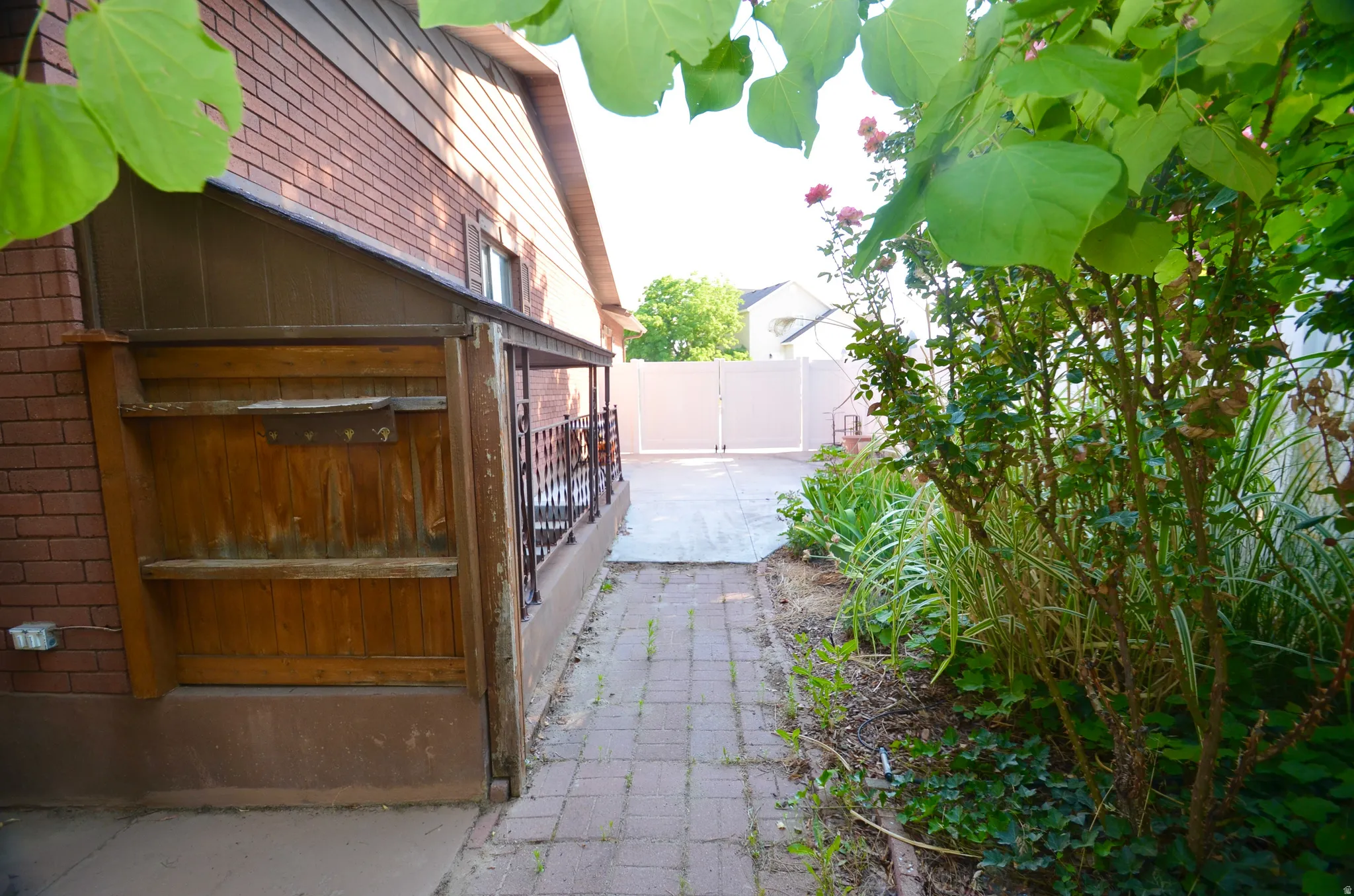 Brick exterior with brown siding detail