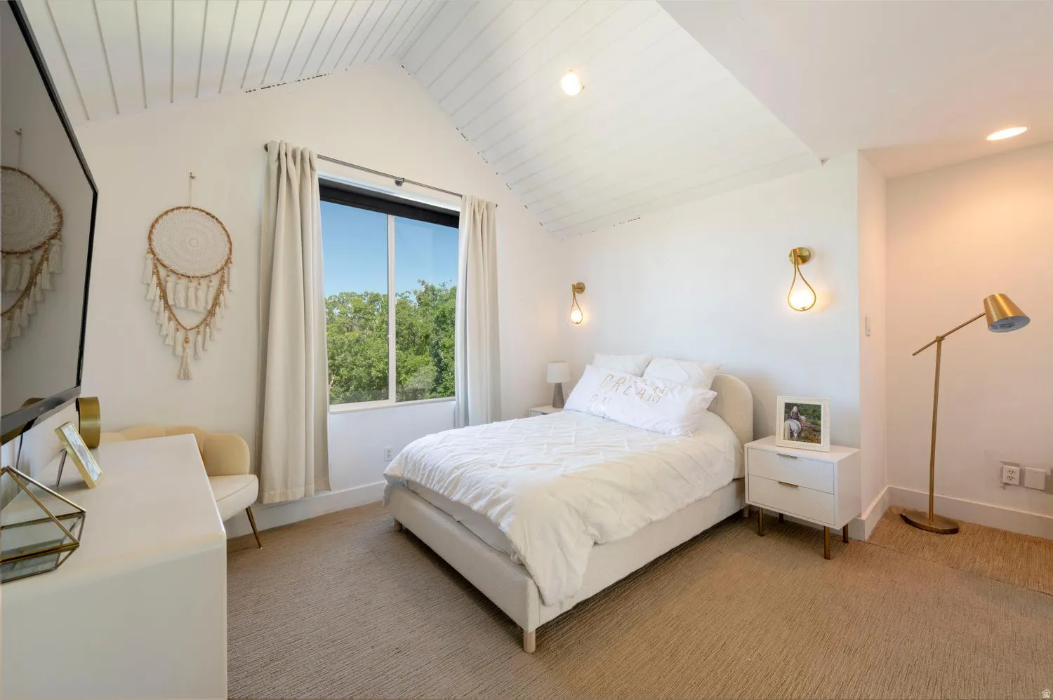 Bedroom featuring a vaulted ceiling with shiplap, a large picture window, and recessed lighting