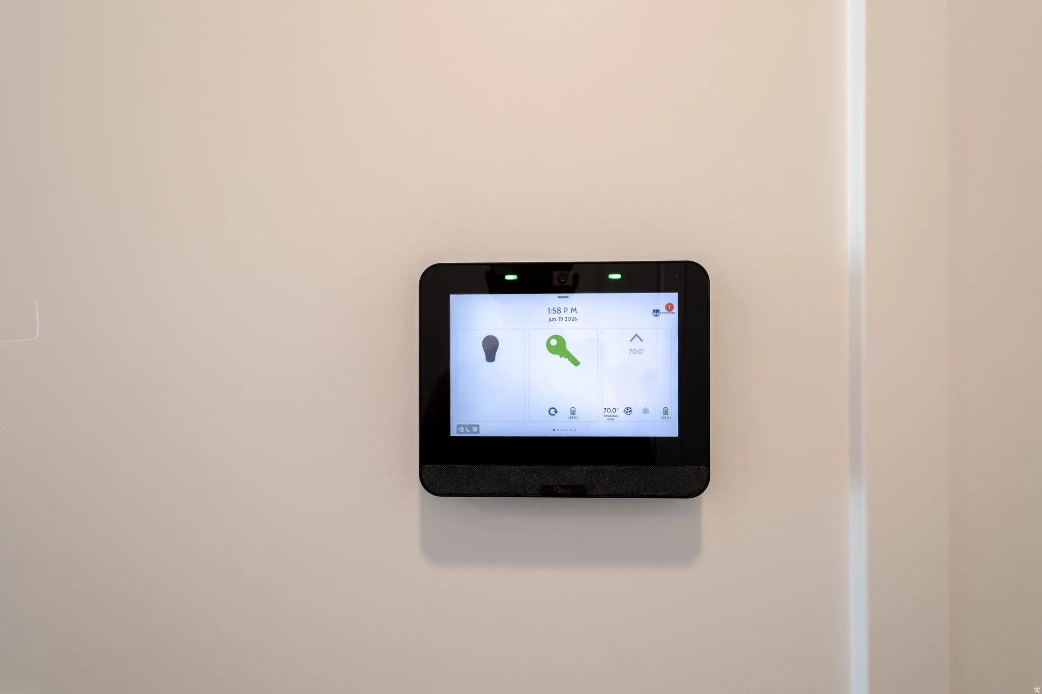 Wall-mounted control panel featuring a digital display