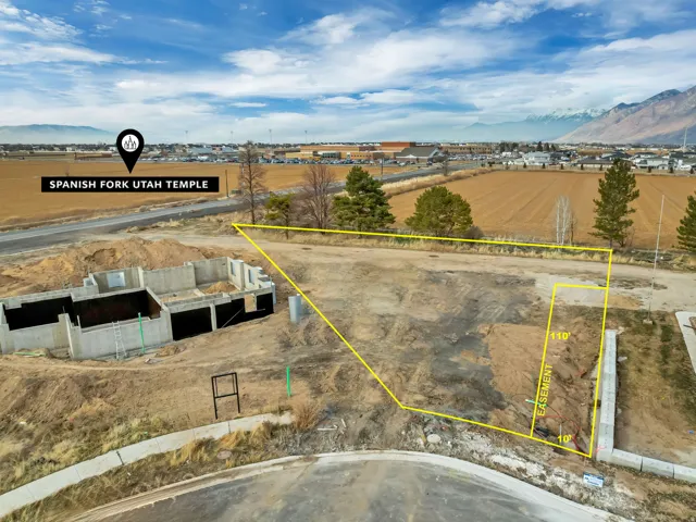 Partially excavated lot with visible foundation work and a cul-de-sac street