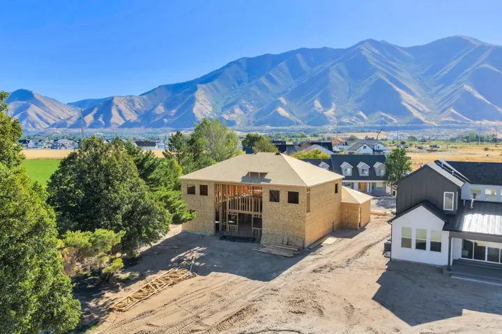 Newly framed construction with mountain scenery