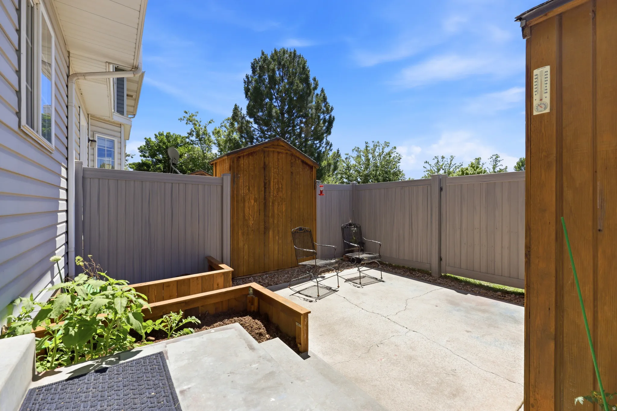 Outdoor patio area featuring concrete paving