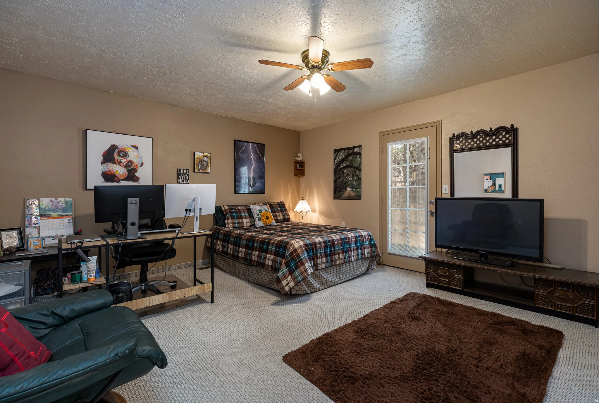 Guest bedroom with entry to backyard