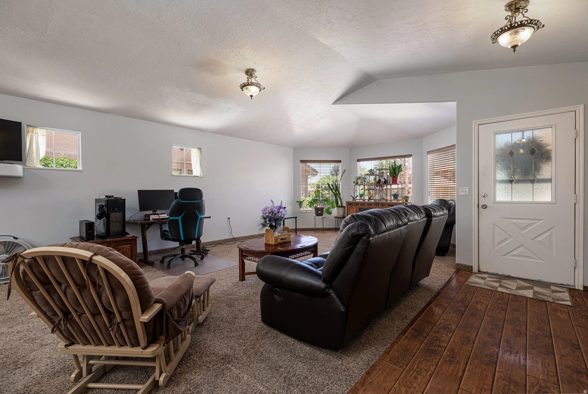 Spacious living room with vaulted ceilings