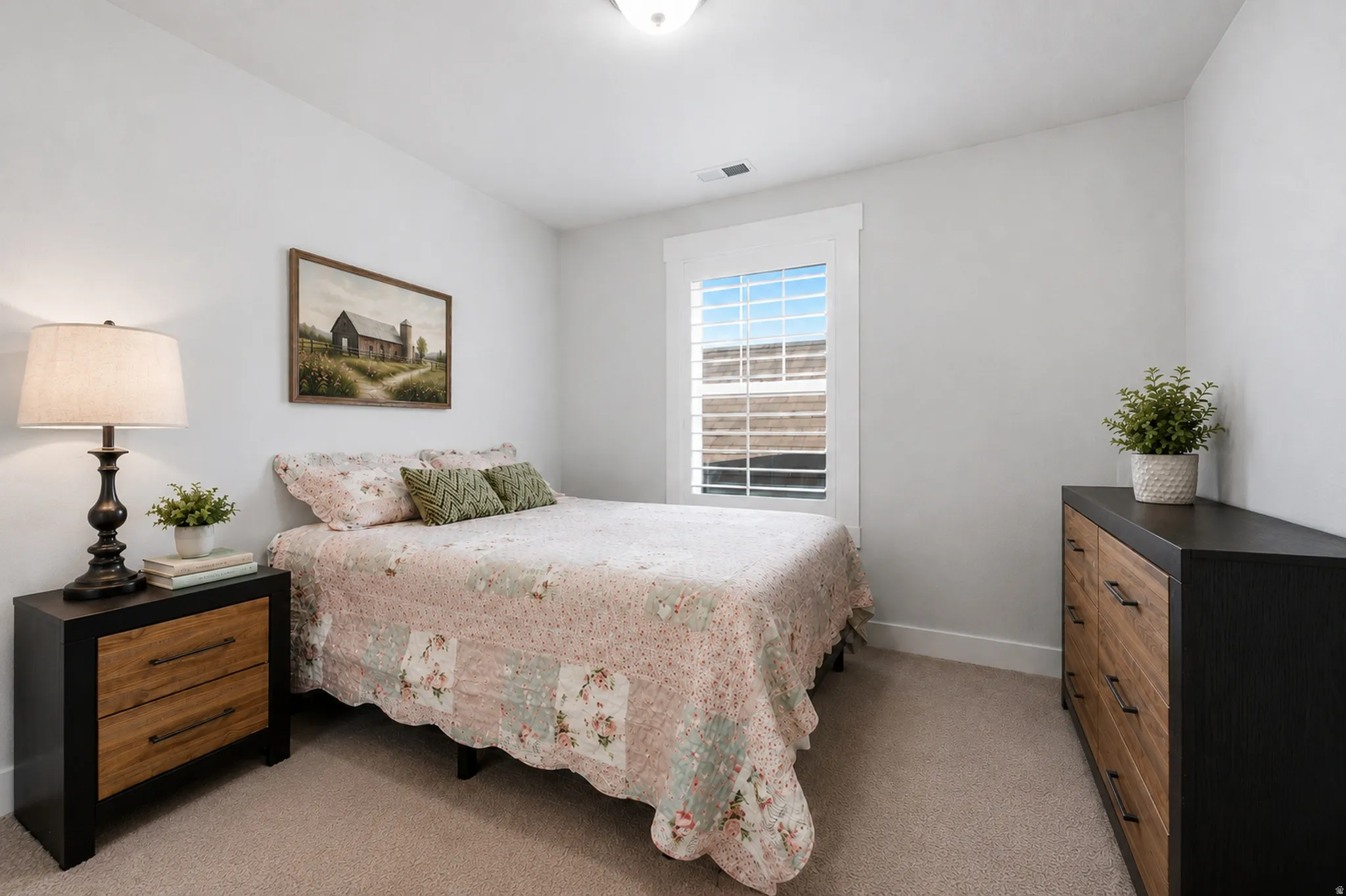 Window with white plantation shutters
