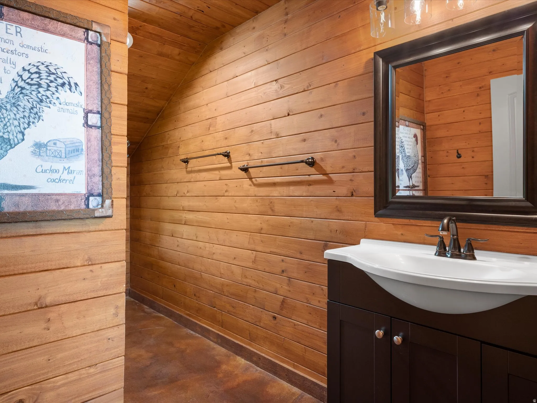 Wood-finish wall paneling and sloped ceiling