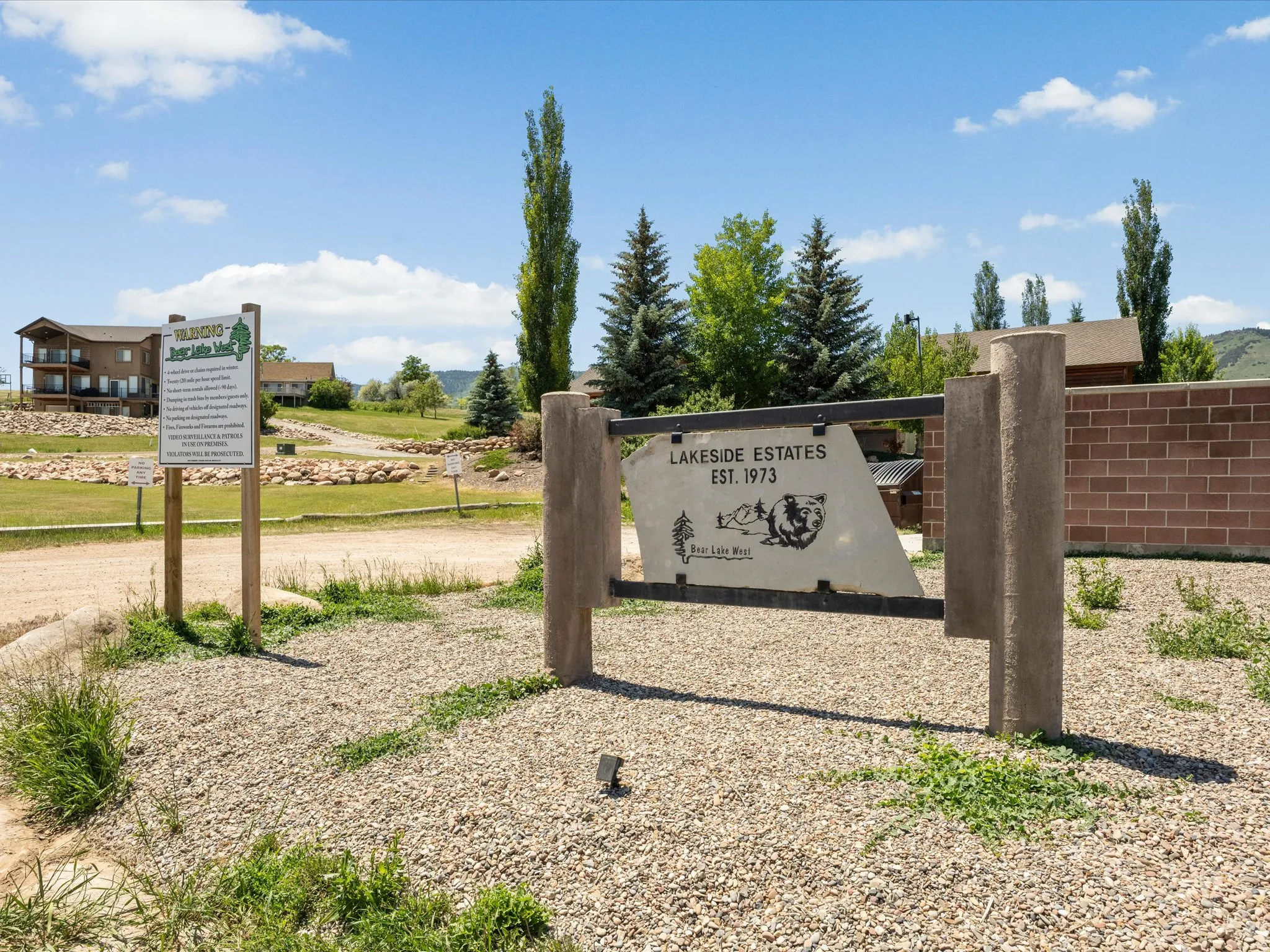 Lakeside Estates community entrance sign with stone accents and established landscaping