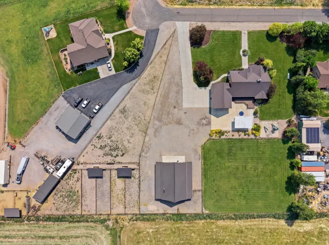 Expansive property featuring multiple structures and abundant outdoor space