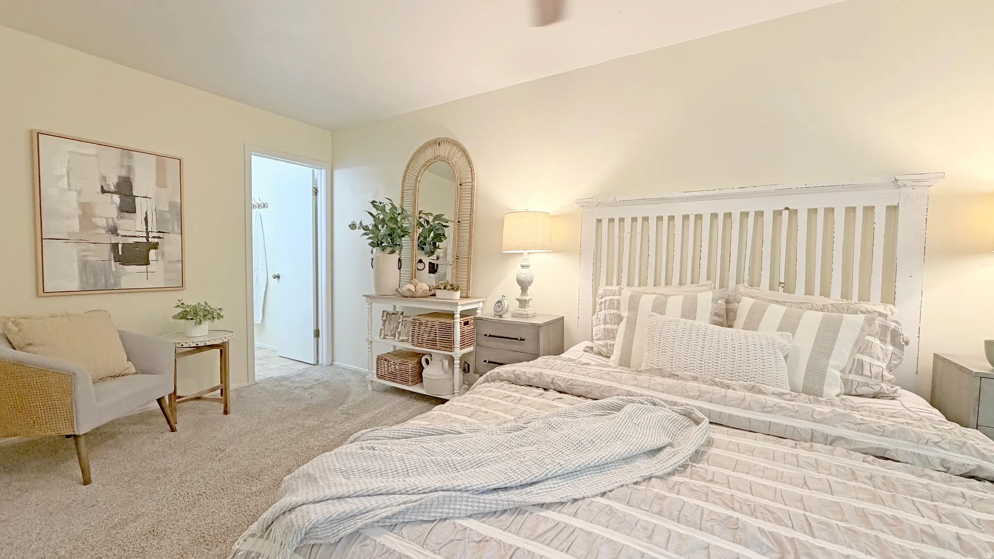 Primary bedroom featuring plush carpeting