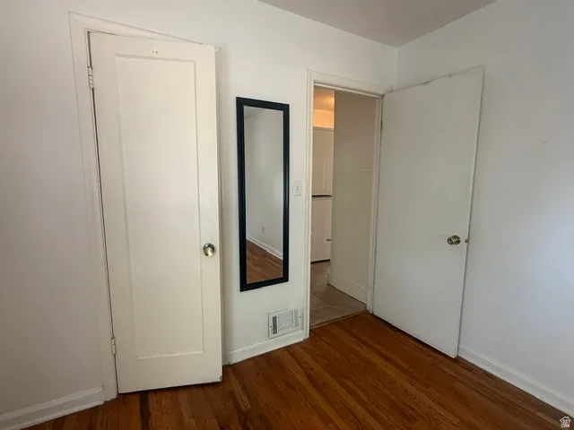 Hardwood flooring and white trim throughout