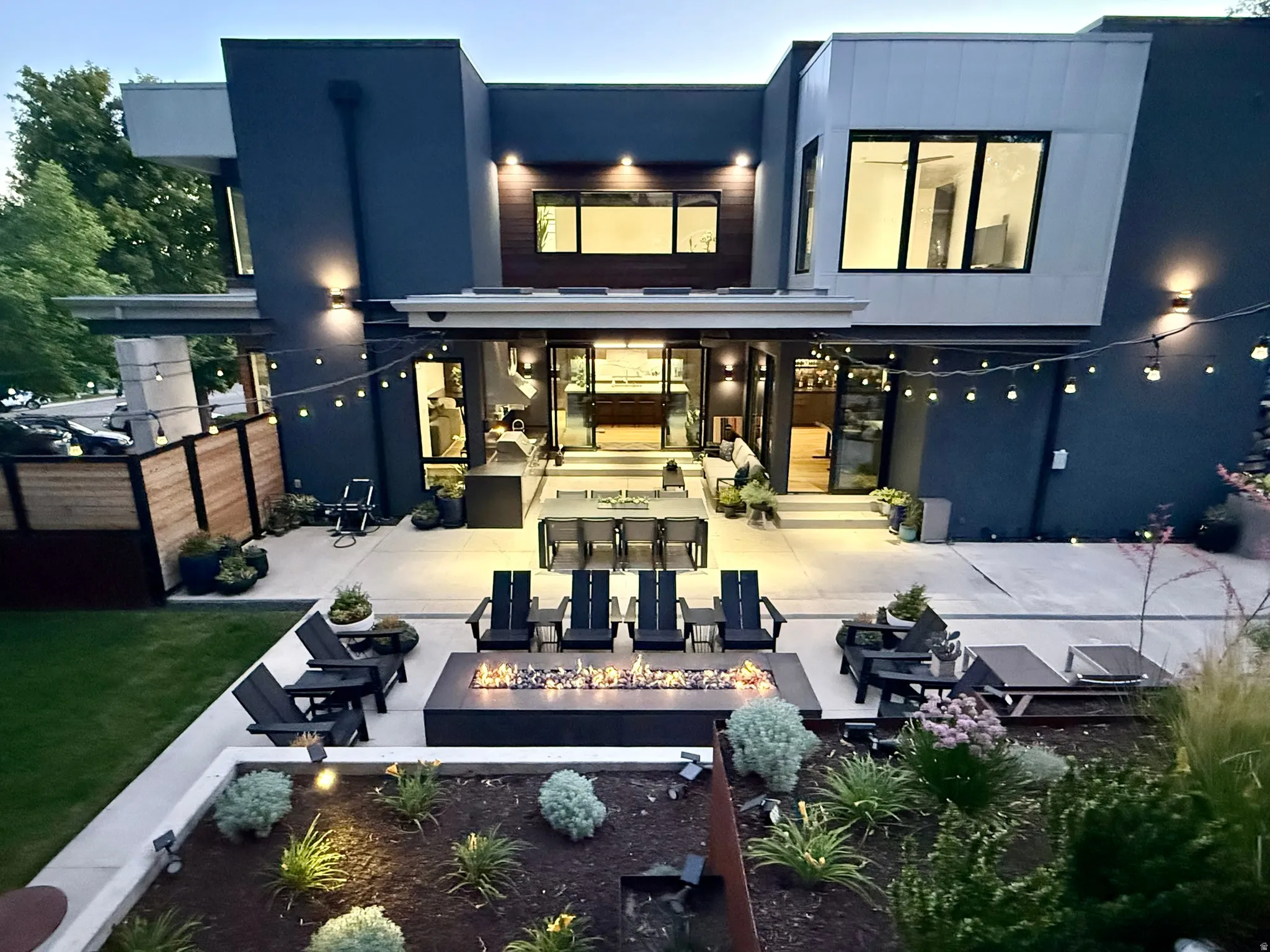 Contemporary multi-level exterior with dark gray and light gray siding