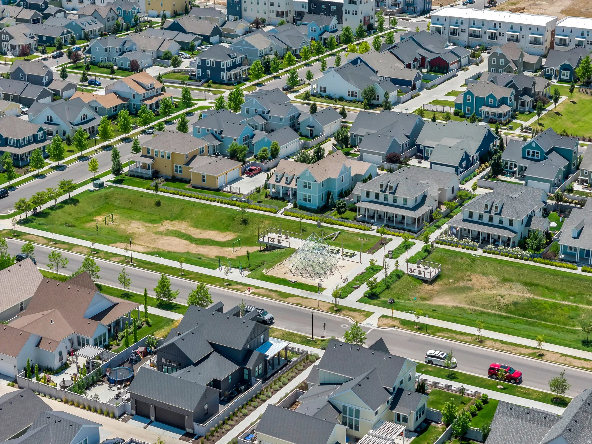 Aerial perspective showcasing a developed residential neighborhood with a variety of architectural styles