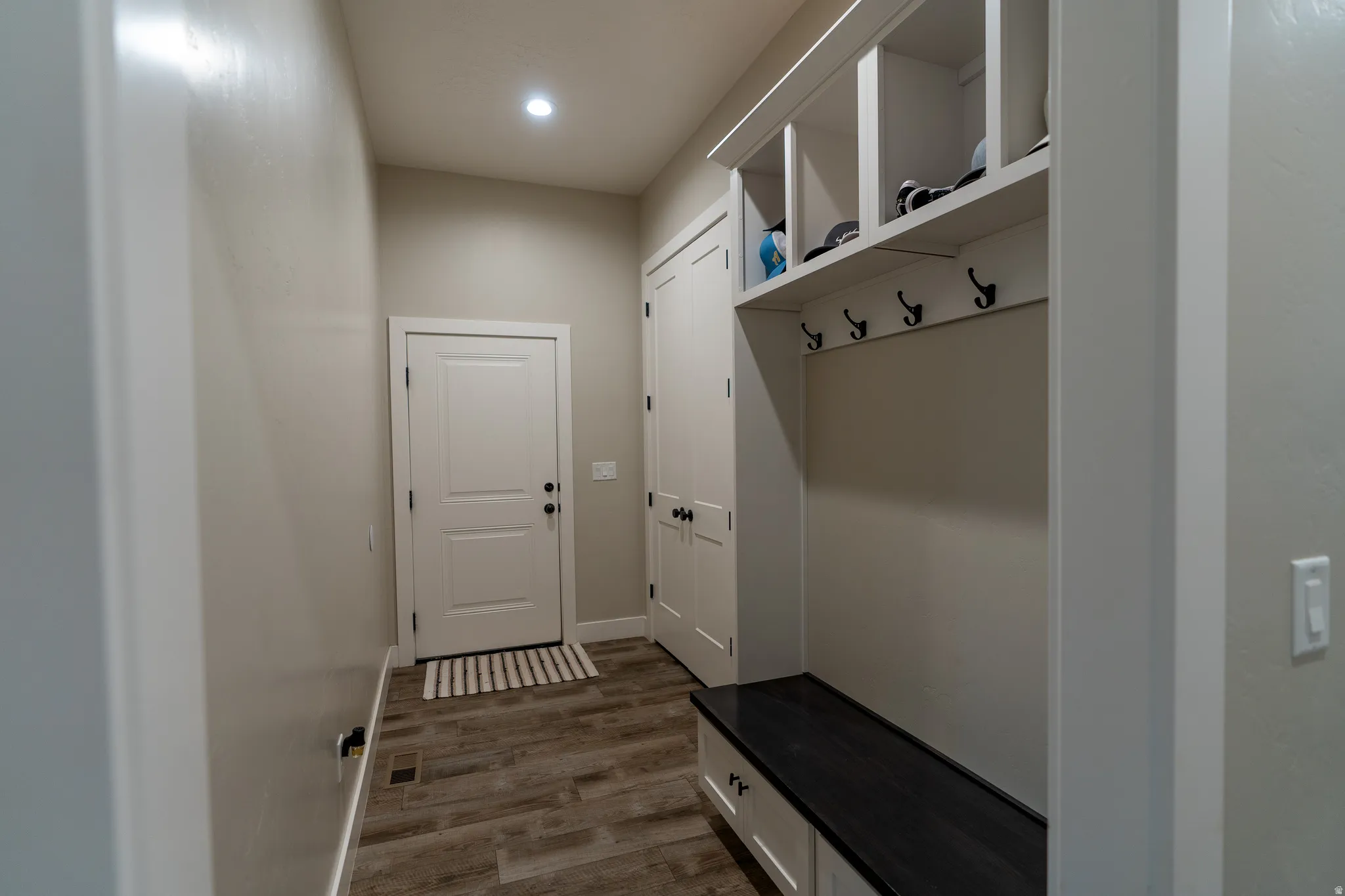 Entryway featuring wood-finish flooring and a recessed light fixture