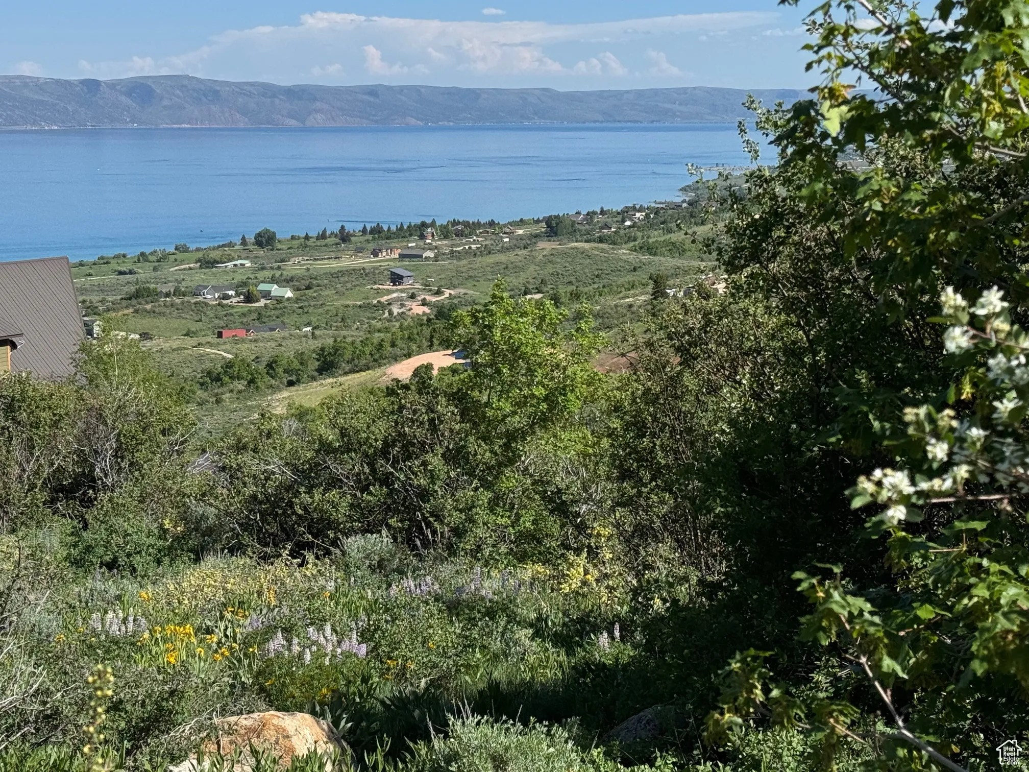Expansive water body and distant mountain range backdrop