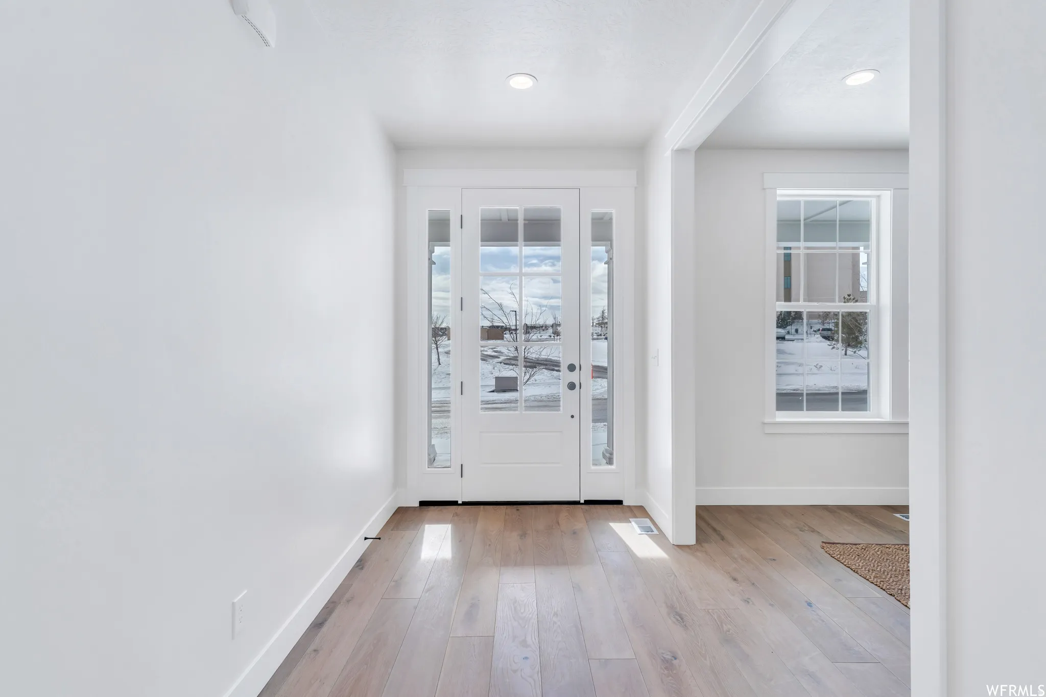 Natural light fills the entryway