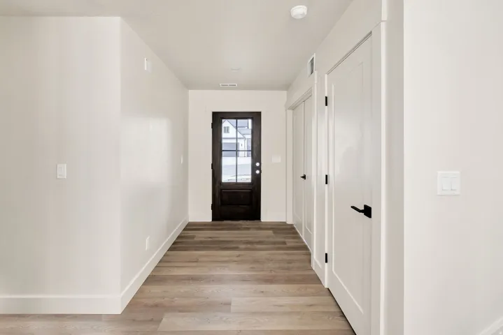 Wood-finish flooring with crisp white walls