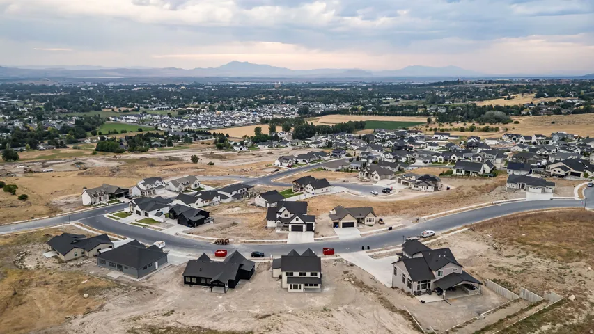 Expansive residential development featuring modern residences and mountain scenery