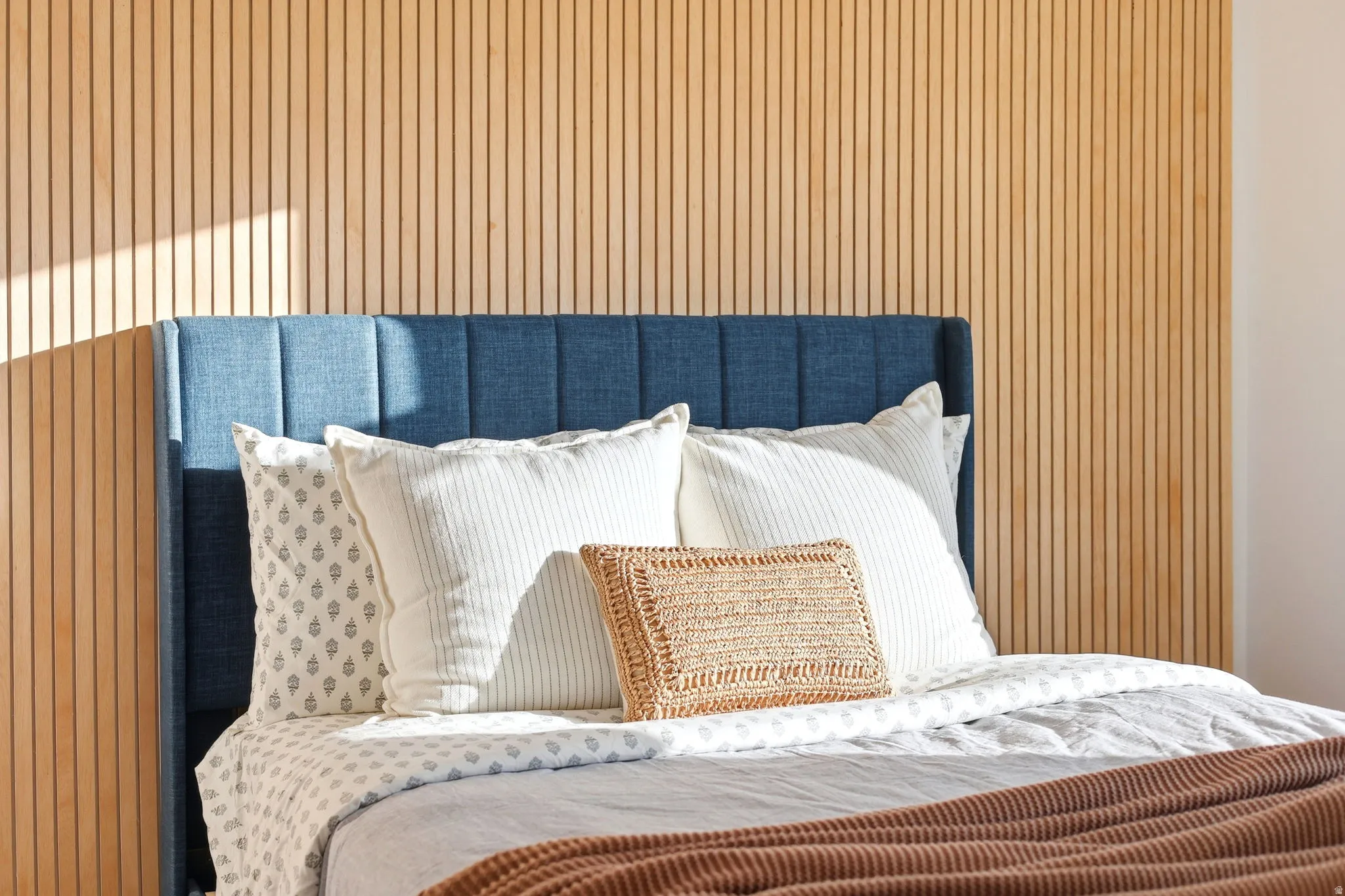 Vertical wood slat wall paneling