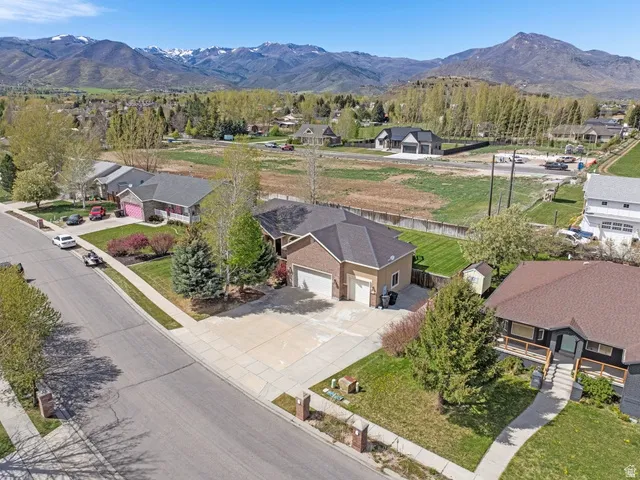 Large 3 car garage with high ceilings.  There is plenty of RV space for all your toys!