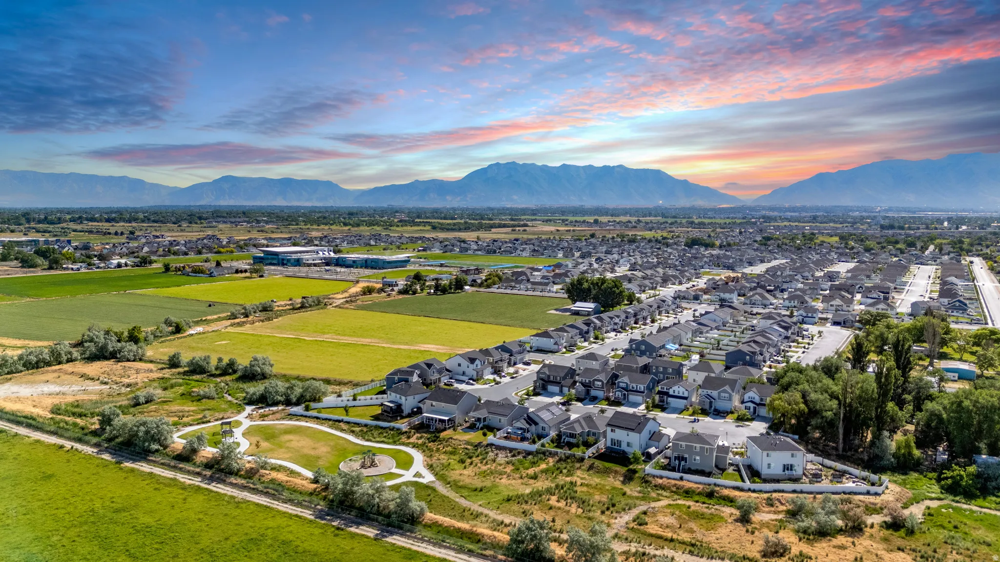 Expansive residential development with mountain backdrop