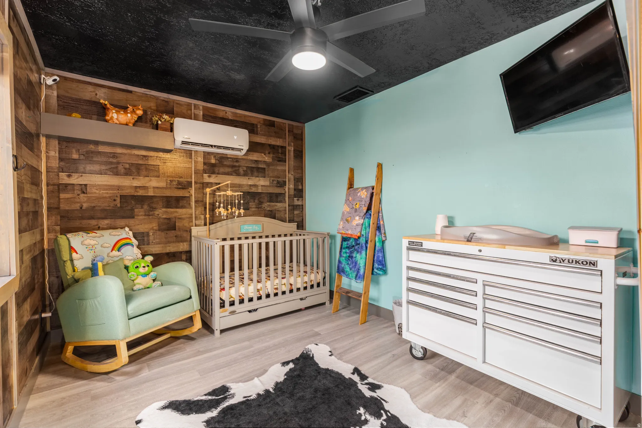 Wood-finish accent wall with a wall-mounted shelving unit