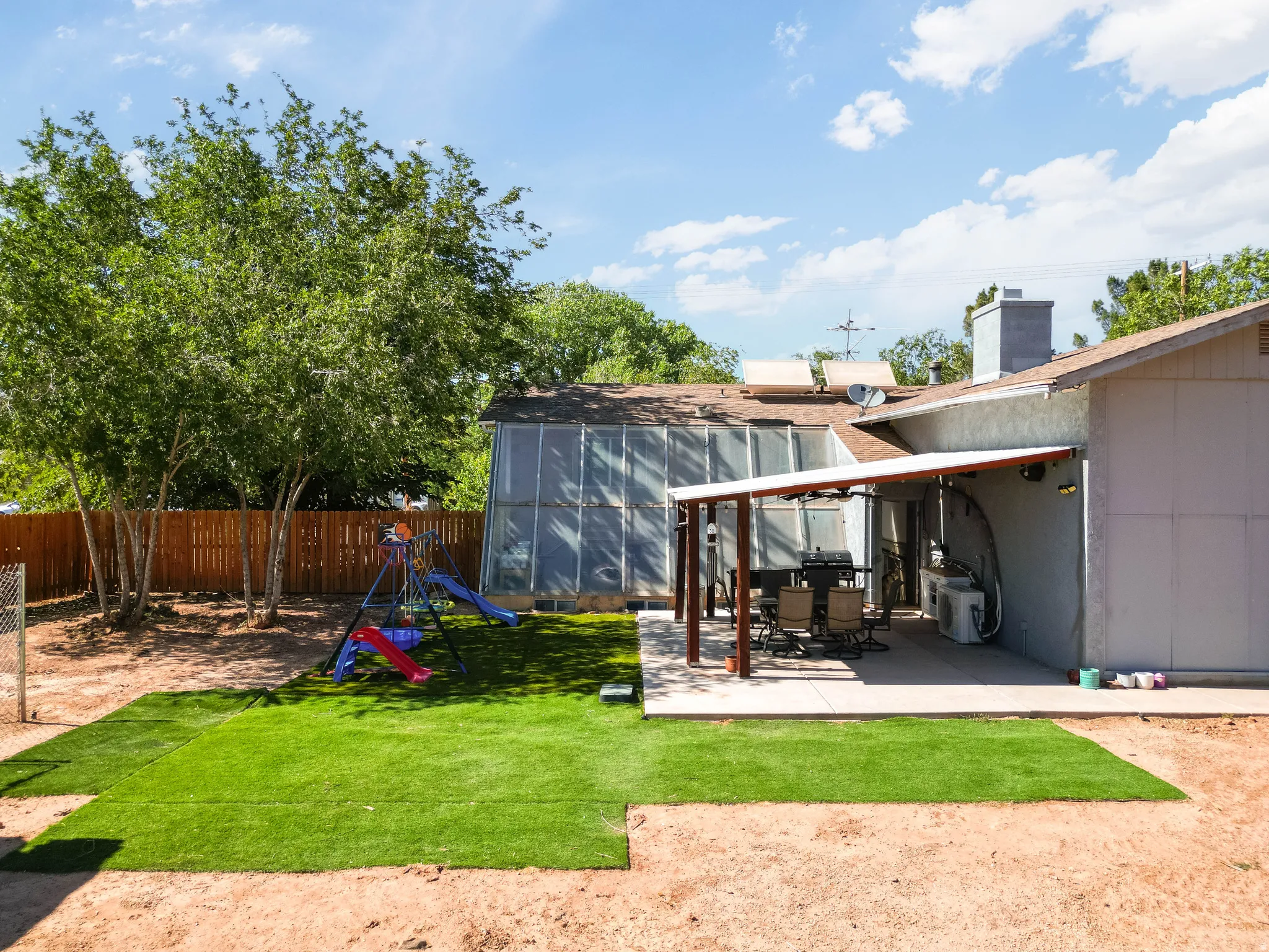 Covered patio with a concrete surface